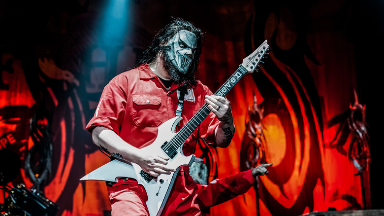 Mick Thomson playing guitar for Slipknot