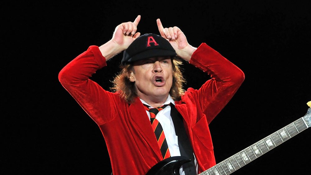 Angus Young in schoolboy uniform