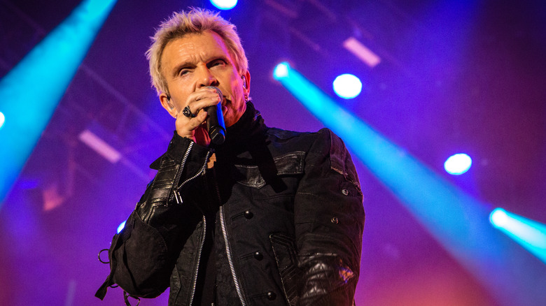 Billy Idol performing with microphone