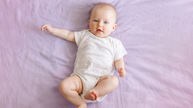 an infant with blue eyes