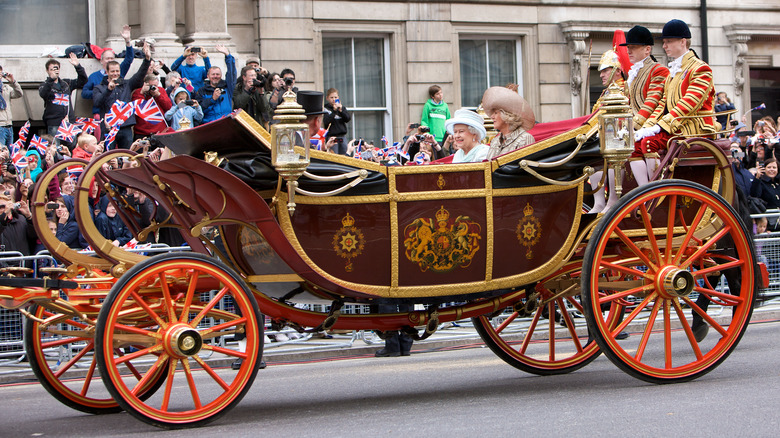 Queen Elizabeth II riding a landau