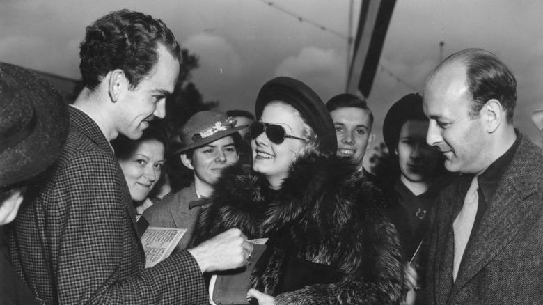 Jean Harlow signing autographs 