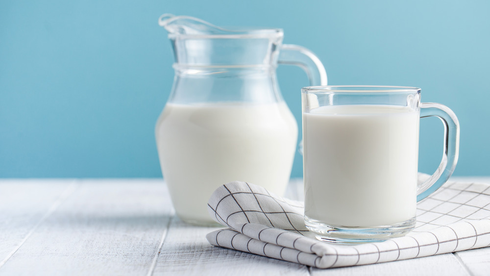 Pitcher and glass of milk