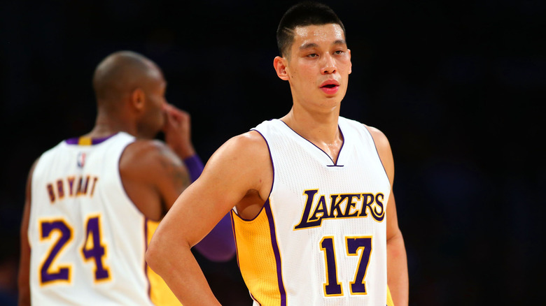 Jeremy Lin looking on with Kobe in background