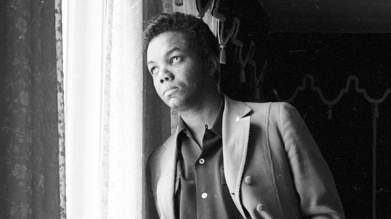 Lamont Dozier looking out window