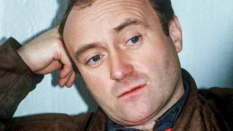 Phil Collins leans back