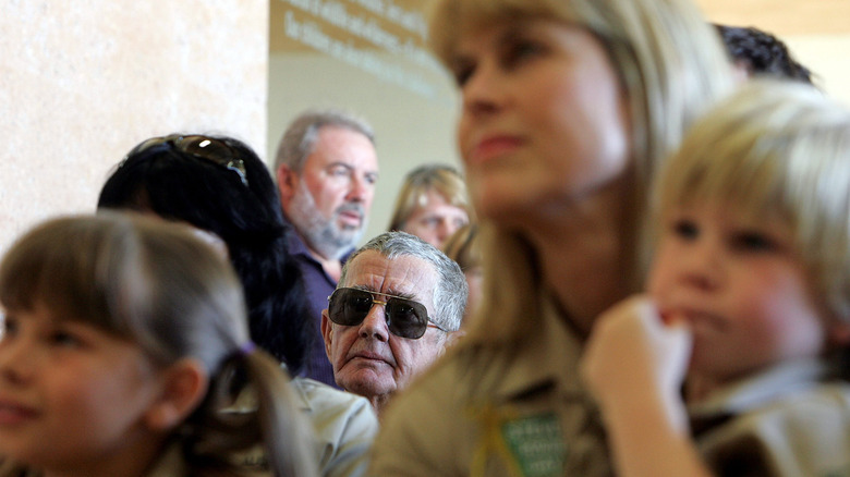 Bob Irwin sitting behind family