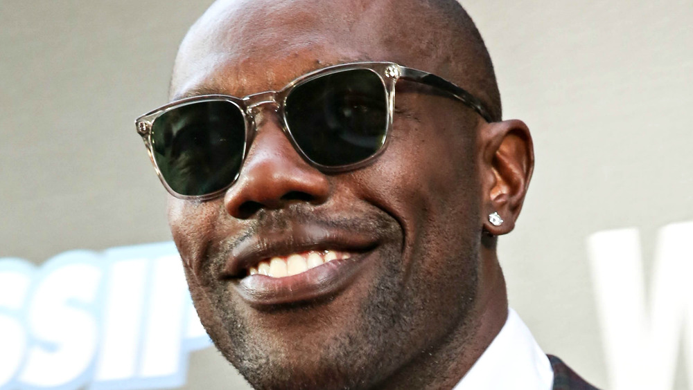 Terrell Owens smiles