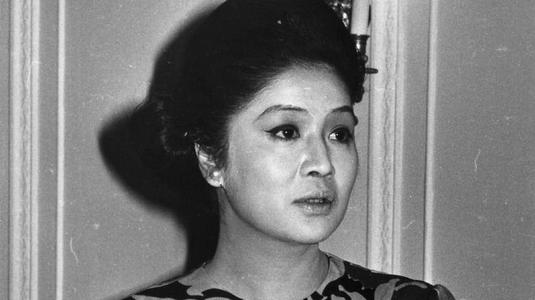 Imelda Marcos posing for photo