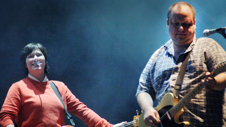 Kim Deal and Black Francis performing