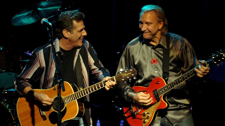 Glenn Frey and Joe Walsh of Eagles play on stage