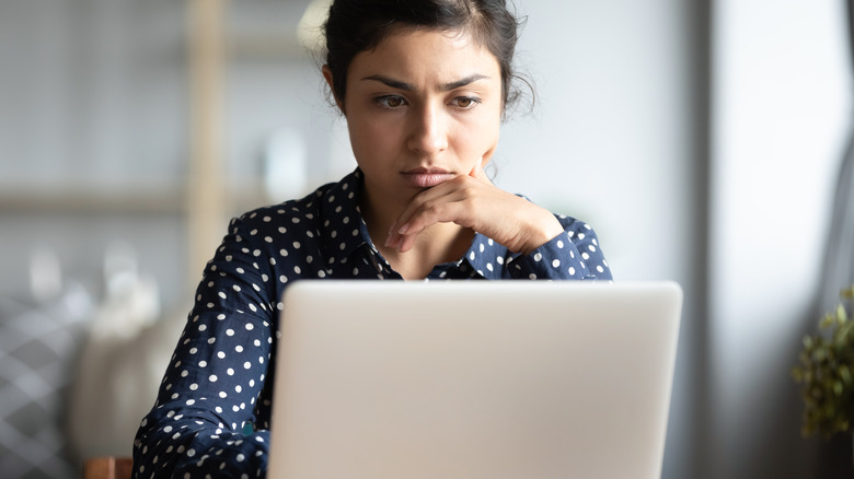 Woman concentrating at her computer