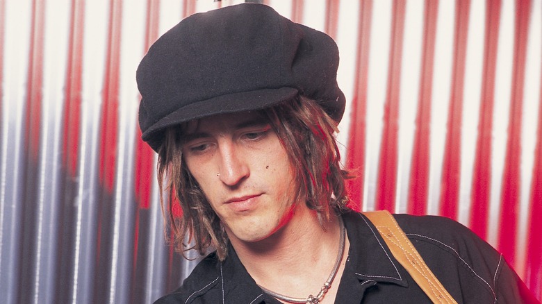 Izzy Stradlin looking down