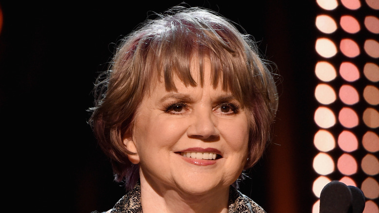 Linda Ronstadt smiling onstage