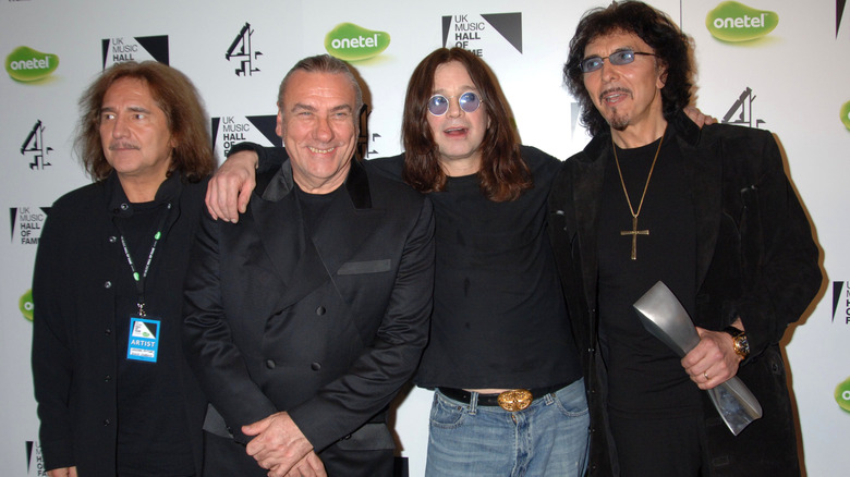 Black Sabbath posing for band photo