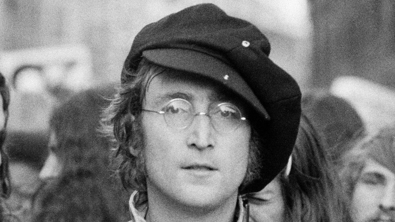 John Lennon wearing hat