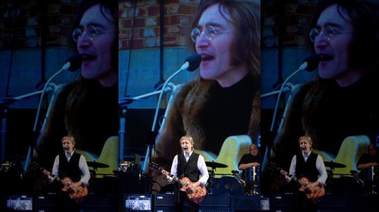 Paul McCartney performing footage John Lennon
