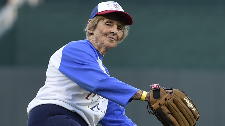 Jeneane Lesko-DesCombes throwing out the first pitch at a baseball game