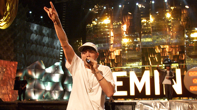 Eminem hand up microphone