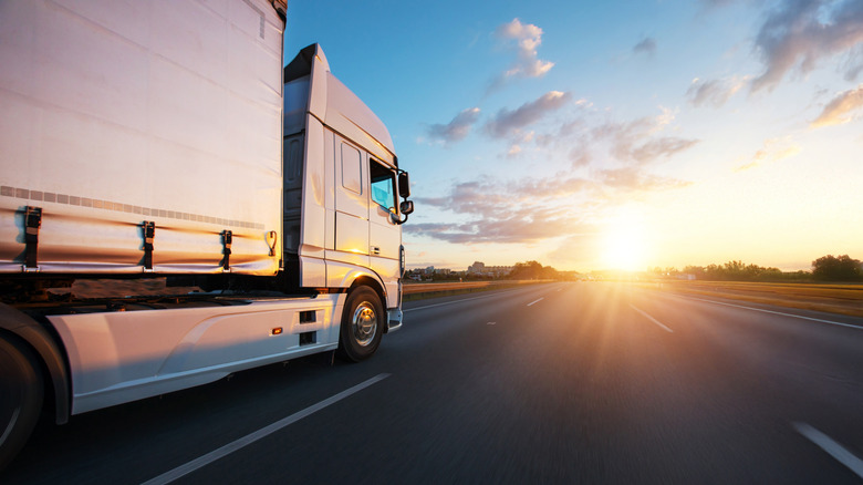 Semi-truck speeding down highway