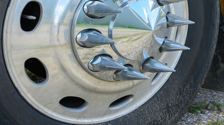 Semi-truck wheel spikes closeup