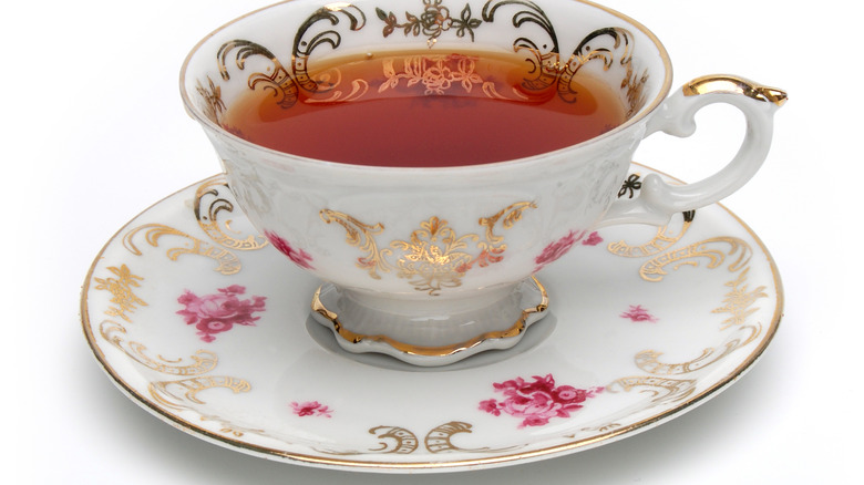 Black tea in antique tea cup