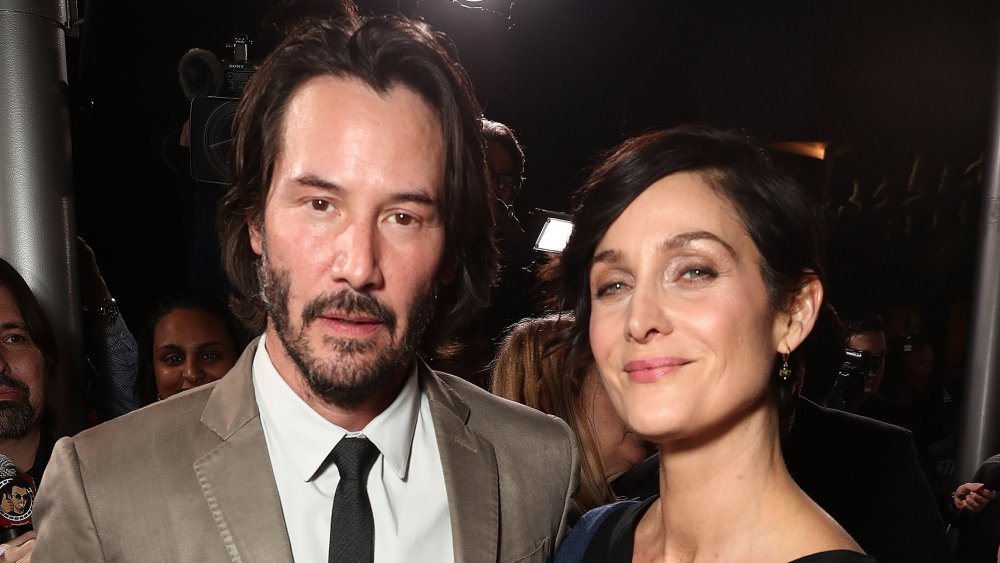 Keanu Reeves and Carrie-Anne Moss