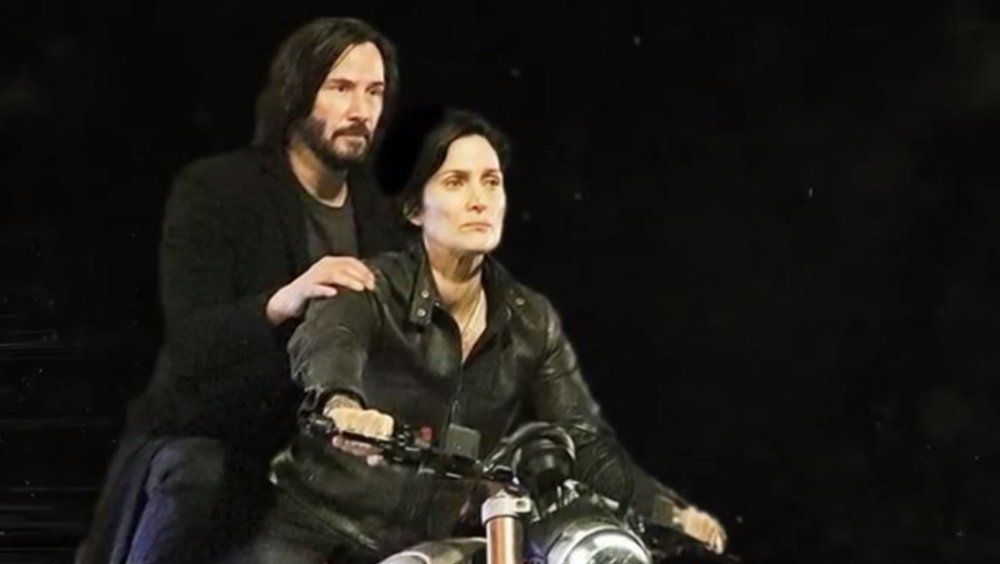 Keanu Reeves and Carrie-Anne Moss