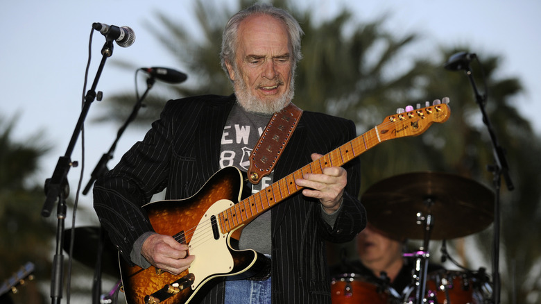 Merle Haggard playing guitar, 2010