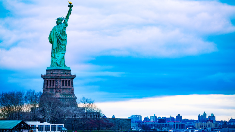 Statue of Liberty over harbor