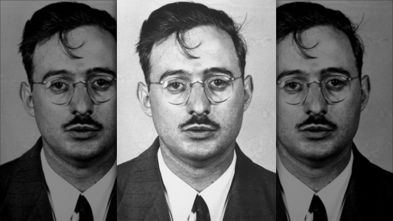 Close-up of Julius Rosenberg in glasses and mustache