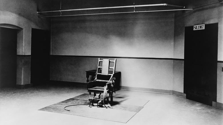 An electric chair in empty room