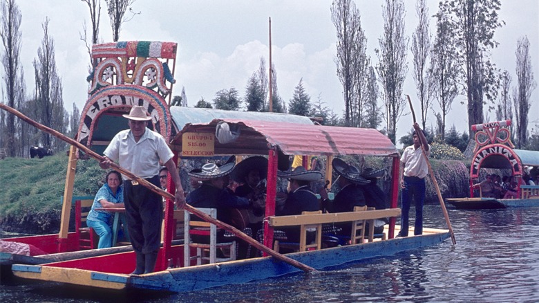 Boatmen at lake Xochamilco