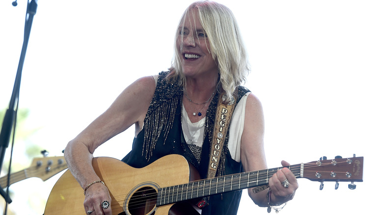 Pegi Young guitar smiling