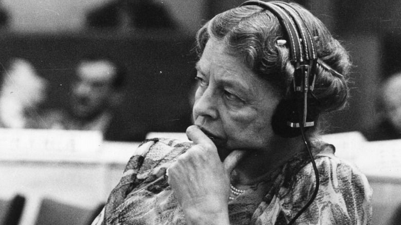 Eleanor Roosevelt listening to a speech