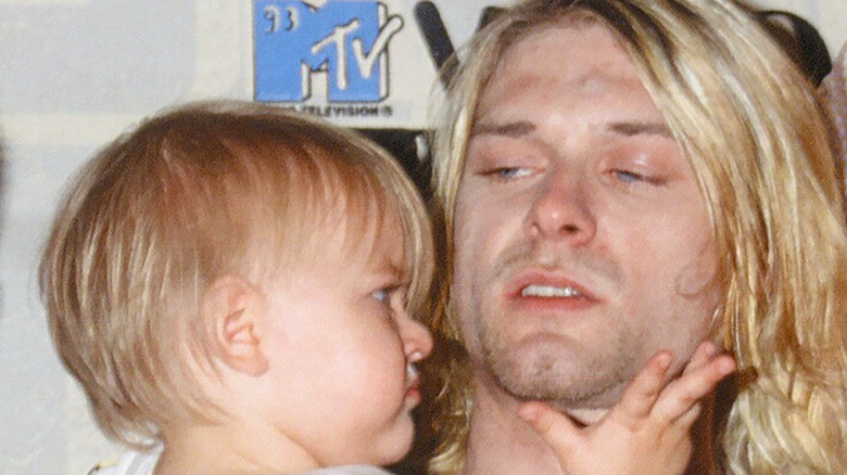 Frances Bean Cobain in father Kurt Cobain's arms