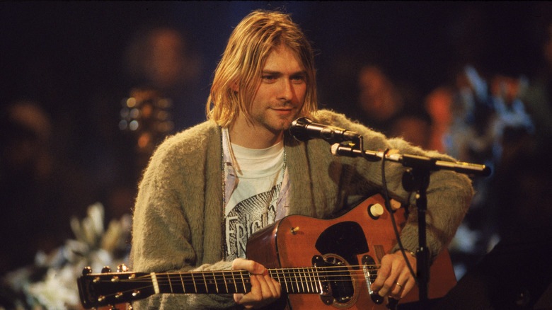 Kurt Cobain playing the guitar