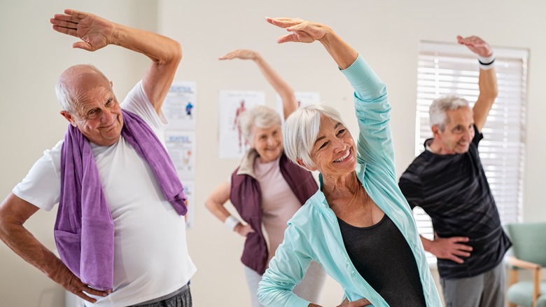 Seniors exercising stretching