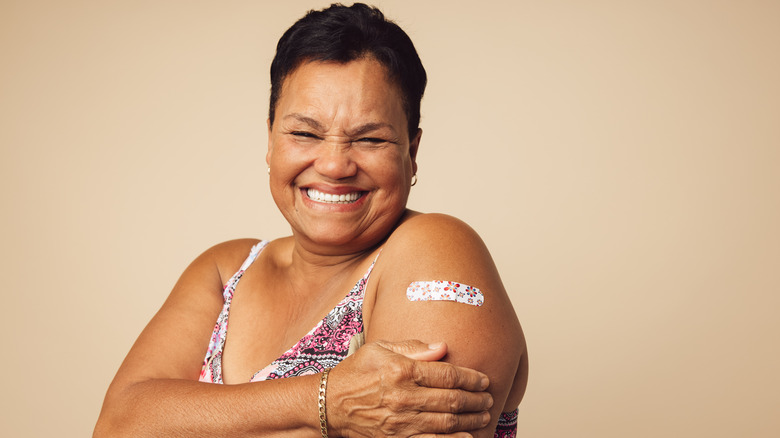 Woman smiling after injection