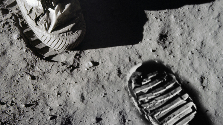 Astronaut walking on moon's surface 