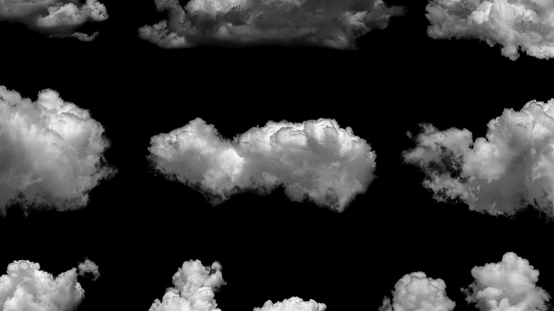 Array of clouds against black background