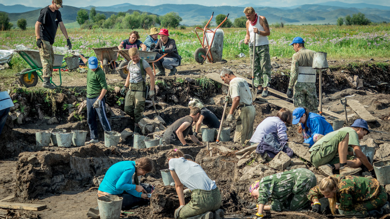 Archeologists unearthing a Scythian burial site