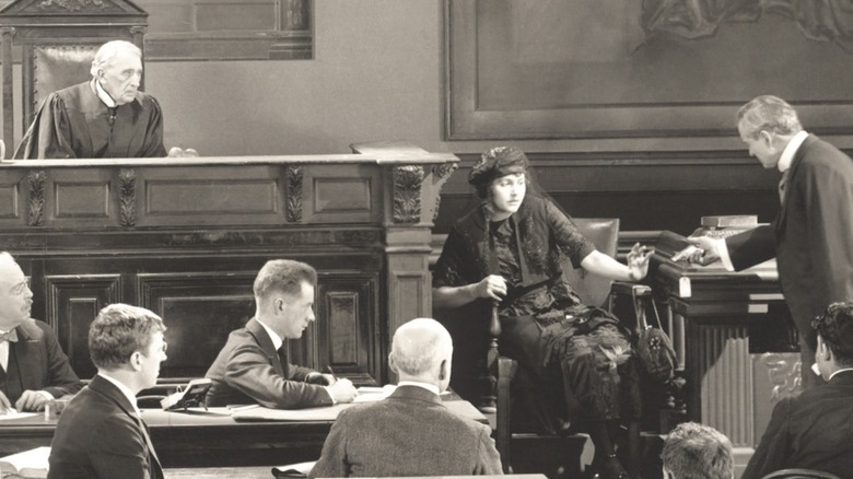 woman at witness stand in court