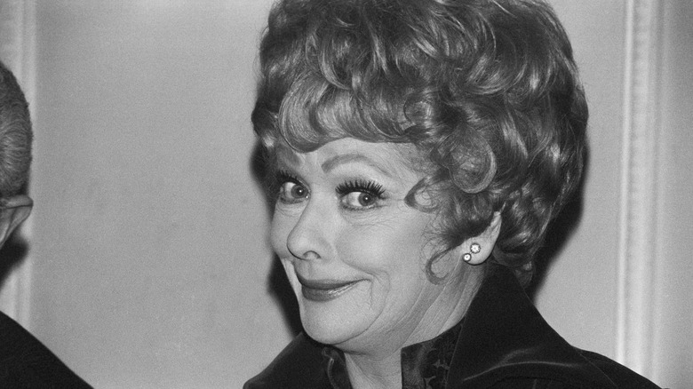 Lucille Ball smiling to side