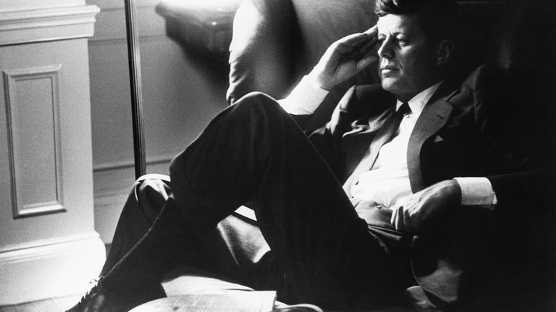 President Kennedy reclines