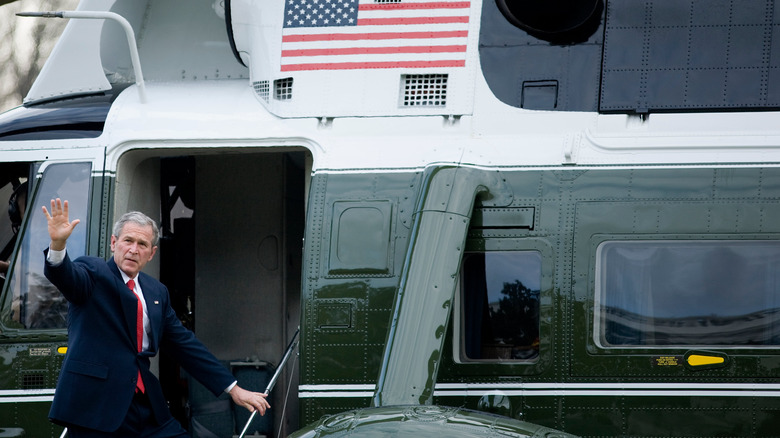 George W. Bush waving outside Marine One