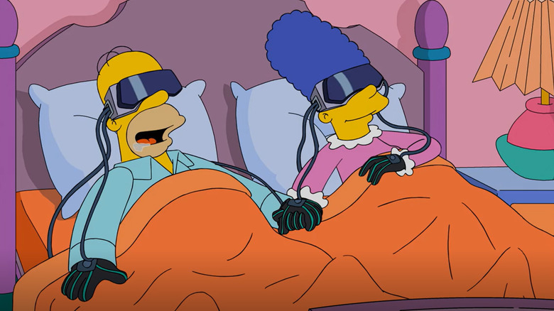 Homer and Marge Simpson lying in bed and wearing their virtual reality headsets in The Simpsons