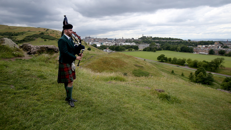 Bagpiper in the British countryside