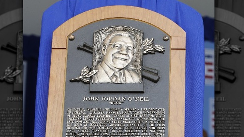 Buck O'Neil Hall of Fame bronze plaque on wood