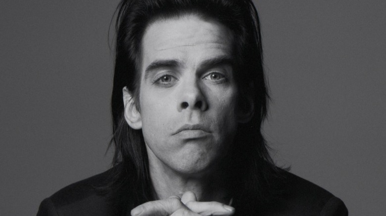 Black and white portrait of Cave in 1995